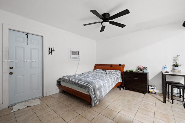 bedroom with a wall unit AC, ceiling fan, and light tile patterned floors