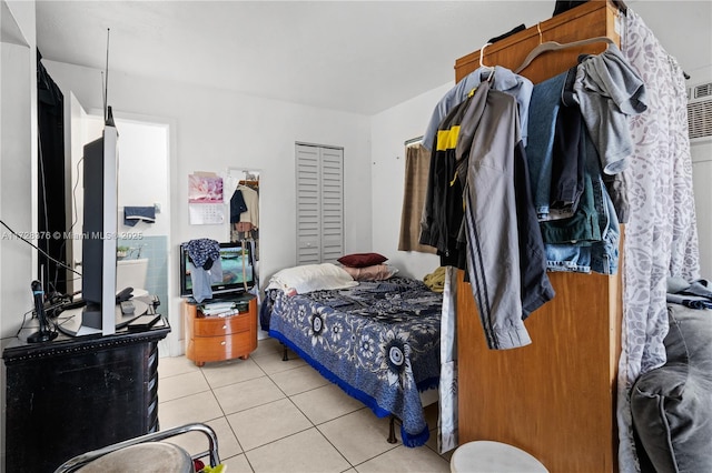 bedroom with light tile patterned flooring