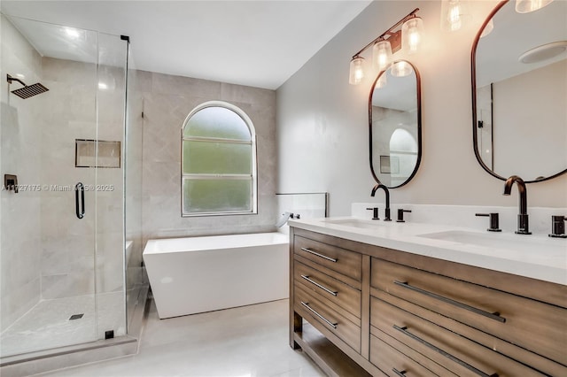 bathroom featuring vanity, separate shower and tub, and tile patterned flooring