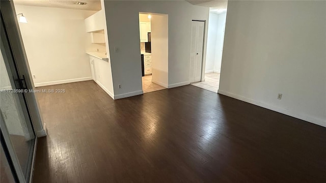 unfurnished living room with light wood-type flooring