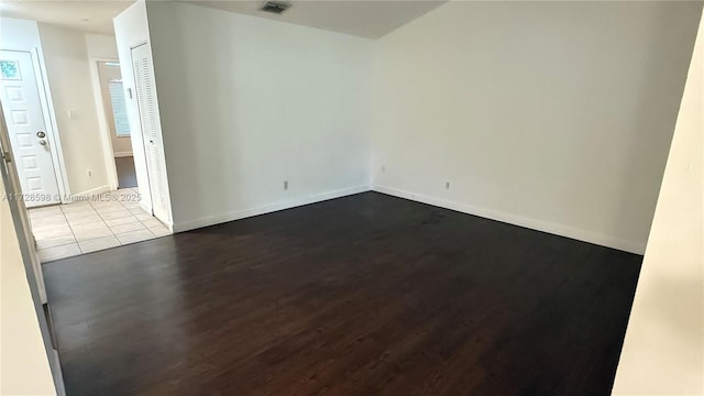 spare room with light hardwood / wood-style floors