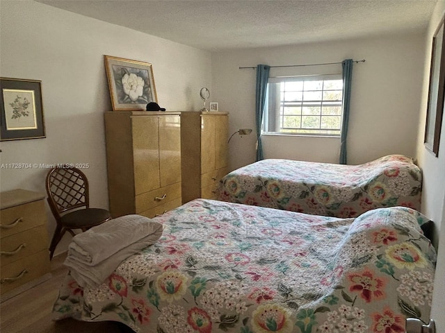 bedroom with a textured ceiling