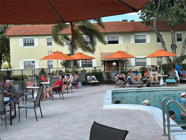 view of swimming pool featuring a patio