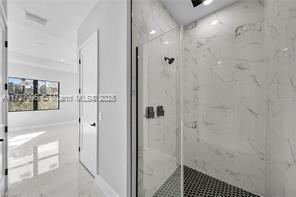 bathroom with walk in shower