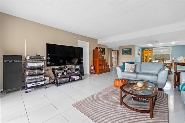 living room featuring light tile patterned floors