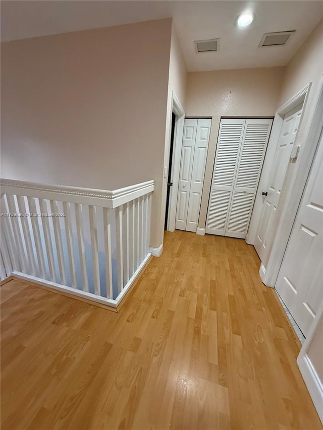 hall featuring light hardwood / wood-style floors