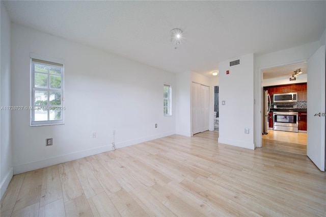 empty room featuring light hardwood / wood-style flooring