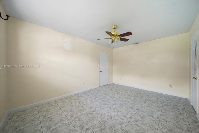 unfurnished room featuring ceiling fan