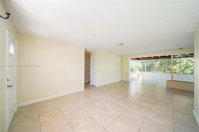 view of tiled empty room