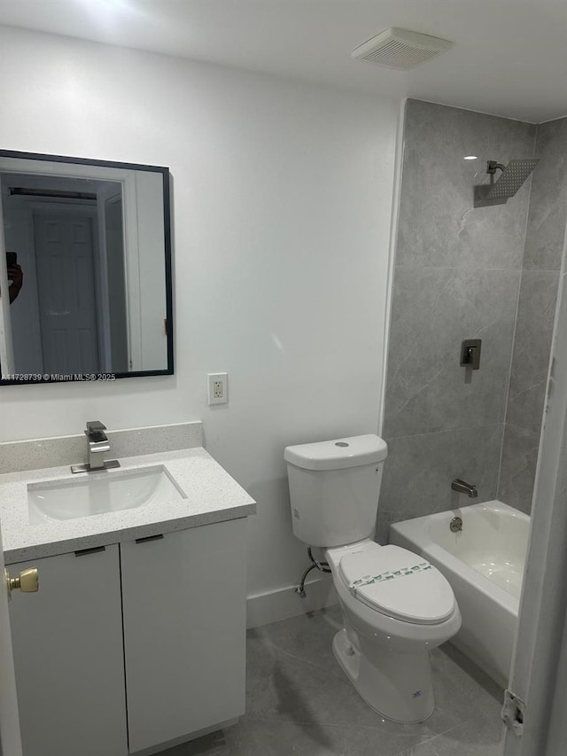 full bathroom with toilet, tile patterned flooring, washtub / shower combination, and vanity