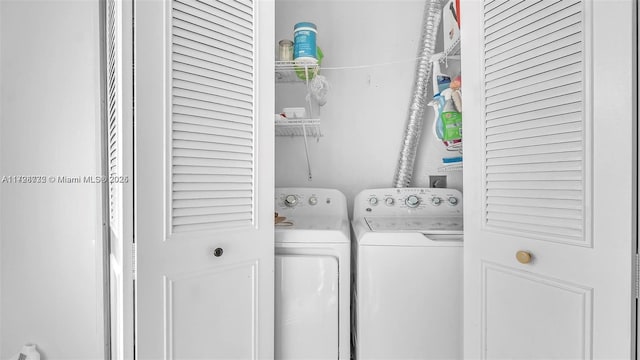 laundry area featuring washer and clothes dryer