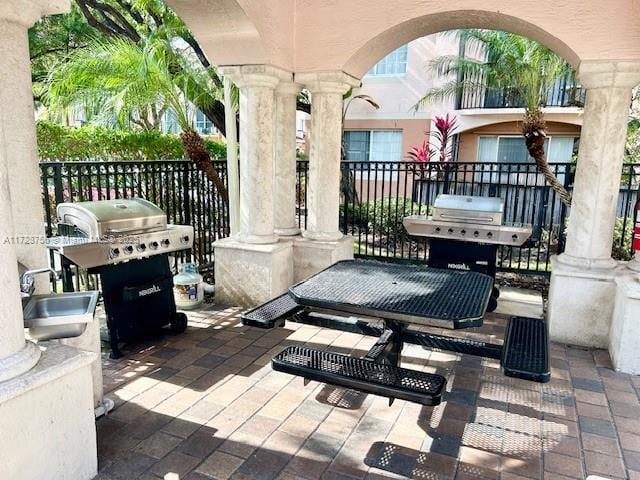 view of patio / terrace with sink and a grill