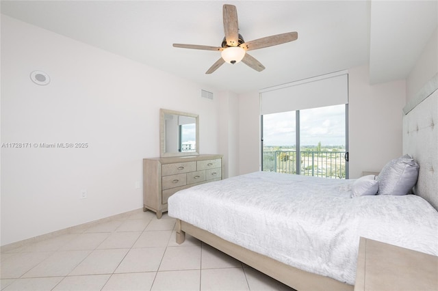 bedroom featuring access to outside, ceiling fan, and light tile patterned flooring