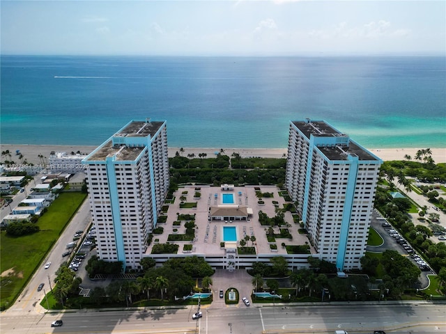 aerial view with a beach view and a water view