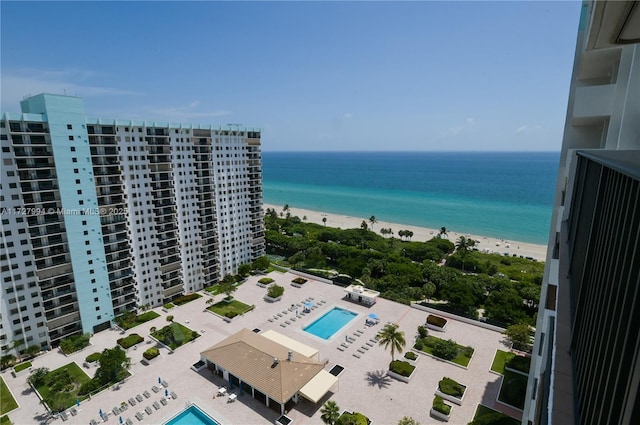 aerial view featuring a water view and a view of the beach