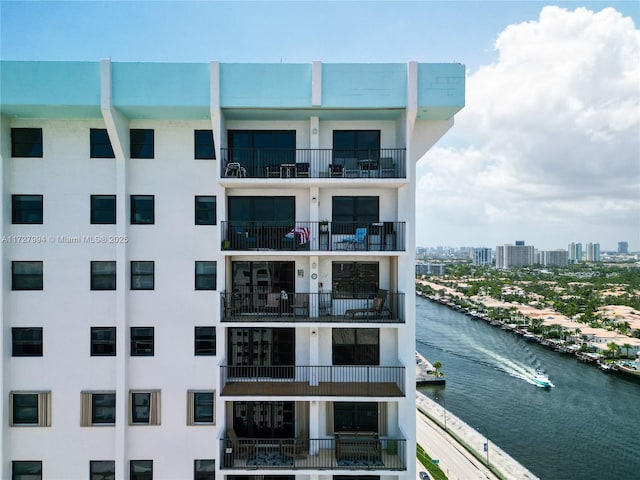 view of property with a water view