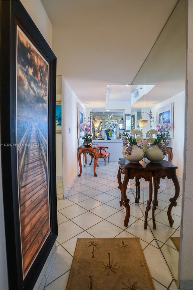 hallway featuring light tile patterned floors