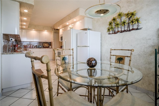 view of tiled dining area