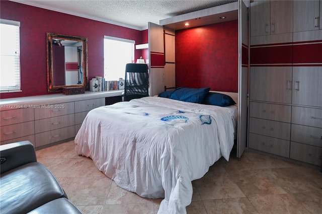 bedroom featuring a textured ceiling