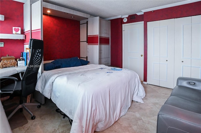 bedroom featuring crown molding and a textured ceiling