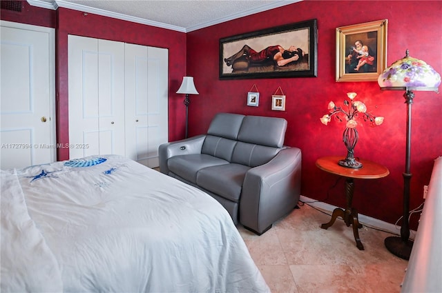 bedroom with light tile patterned floors, crown molding, a closet, and a textured ceiling