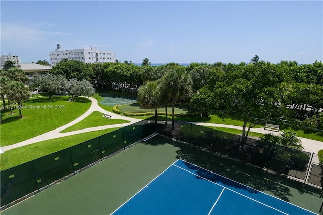 view of property's community featuring a lawn