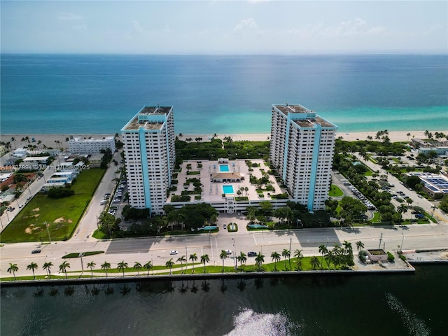 aerial view featuring a water view and a view of the beach