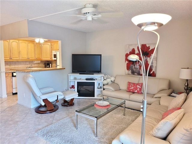 living room featuring ceiling fan