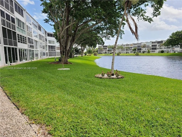 view of yard with a water view