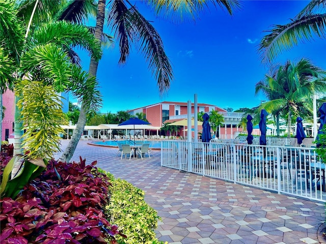 view of home's community with a patio