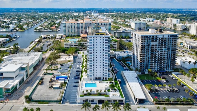 drone / aerial view with a water view