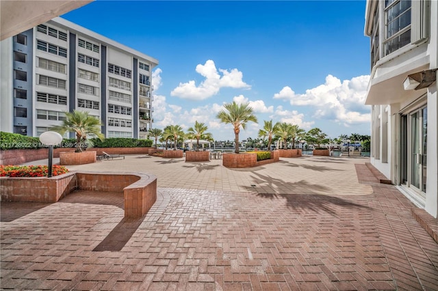 view of property's community featuring a patio area