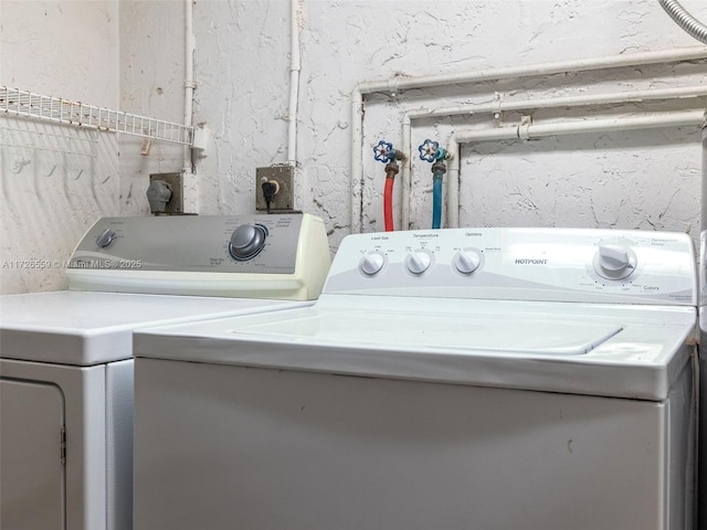 washroom featuring independent washer and dryer