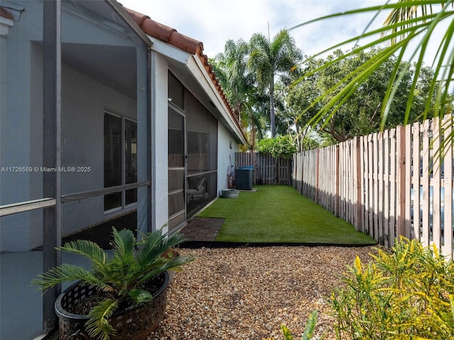 view of yard featuring central AC unit