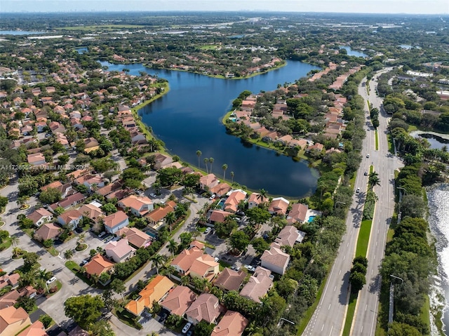 drone / aerial view with a water view