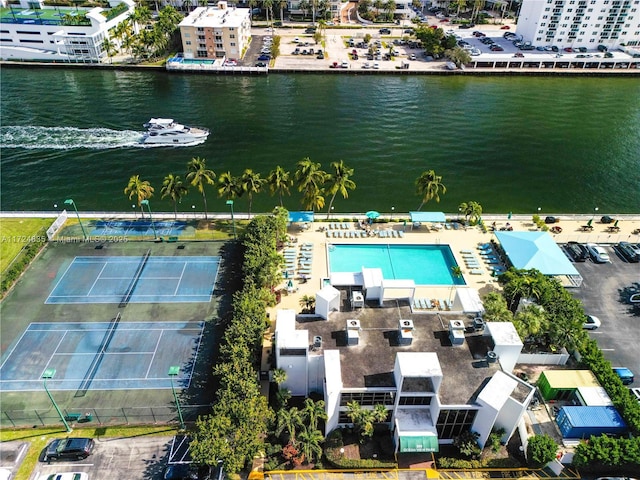 birds eye view of property with a water view