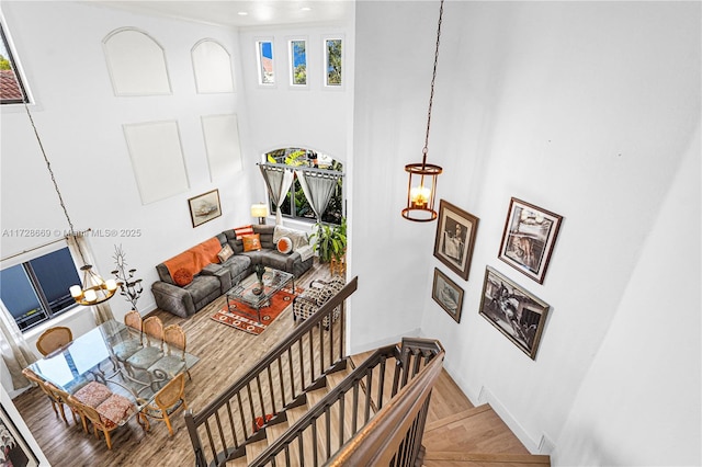 living room with parquet floors and a chandelier