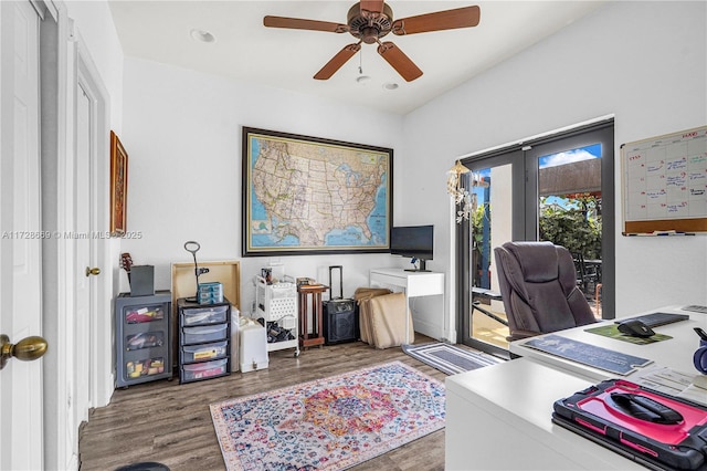 office space with dark wood-type flooring and ceiling fan