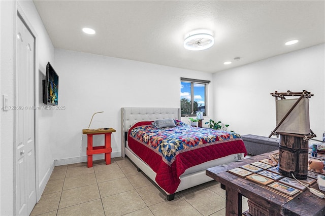 bedroom featuring tile patterned floors