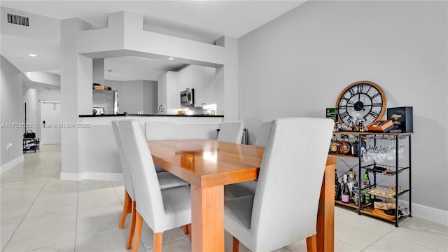 view of tiled dining room