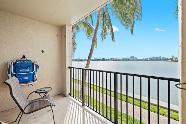 balcony featuring a water view