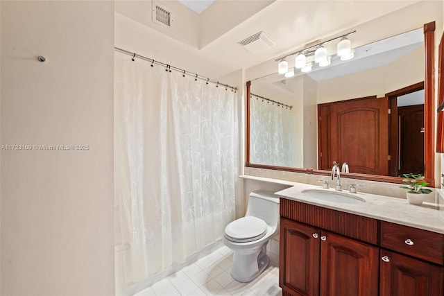 full bath featuring visible vents, vanity, toilet, and tile patterned floors