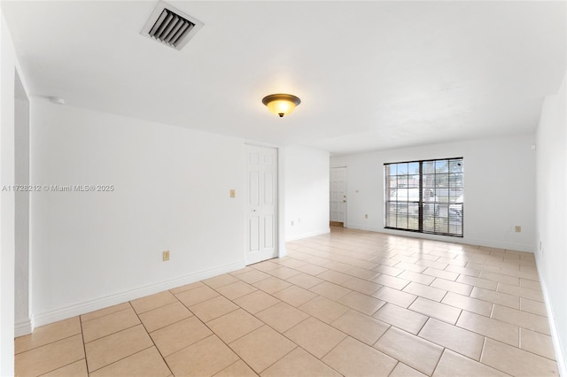 view of tiled spare room