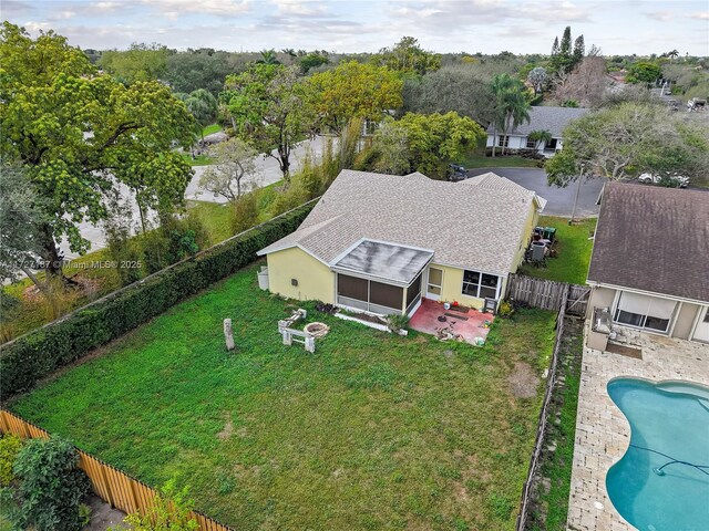 view of yard with a sunroom