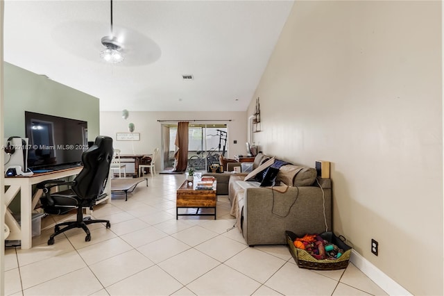 tiled home office with vaulted ceiling and ceiling fan