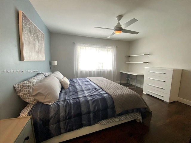 bedroom with ceiling fan and dark hardwood / wood-style flooring