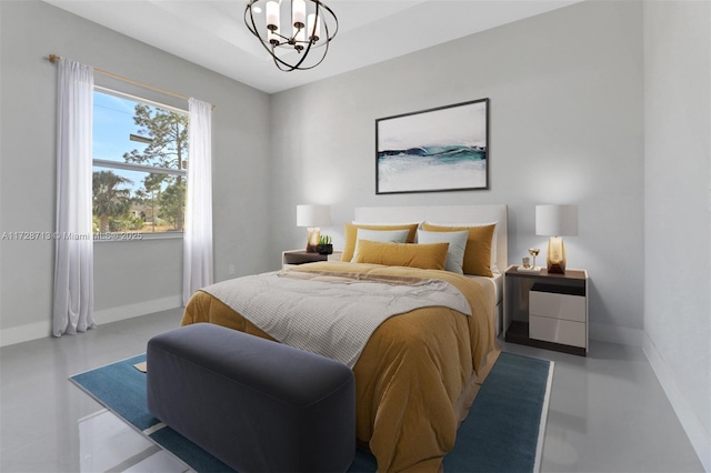 bedroom with a notable chandelier