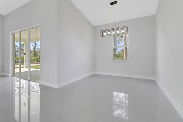 empty room featuring plenty of natural light and french doors