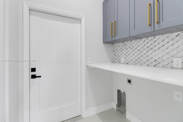 laundry area featuring cabinets and hookup for an electric dryer