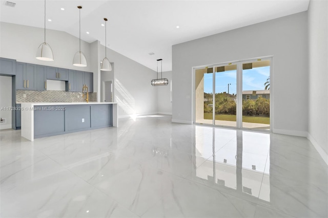 kitchen featuring hanging light fixtures and decorative backsplash